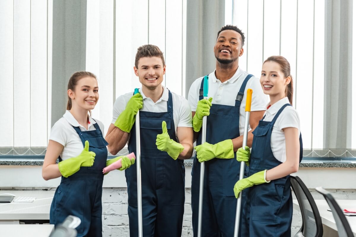 Happy Multicultural Team Of Cleaners