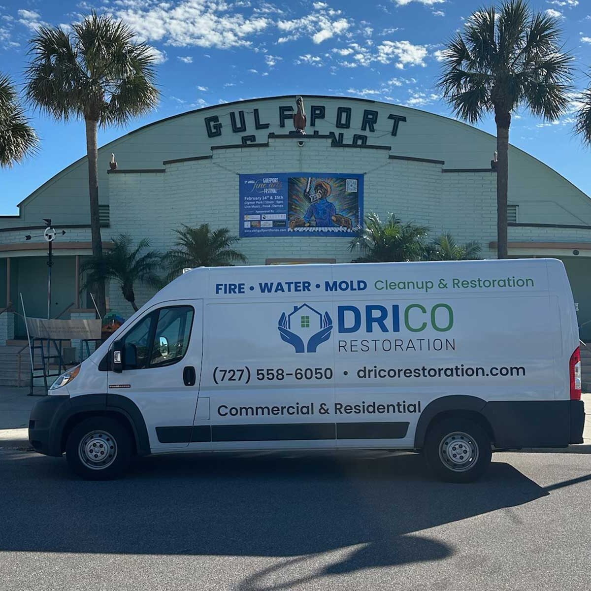 Drico Restoration Cleanup And Restoration Van Parked In Front Of A Buidling