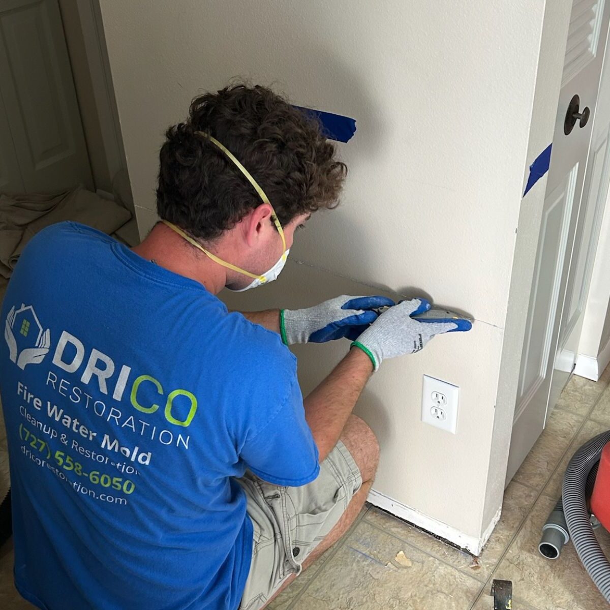Drico Restoration Technician Performing Flood Cut Drywall Removal During Mold Remediation In Gulfport Fl